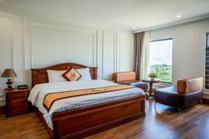 Postel nebo postele na pokoji v ubytování Phu My Hai Hotel