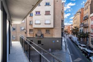 a view of a city street from a building at Centric Apartment Camp Nou in Hospitalet de Llobregat