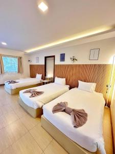 Кровать или кровати в номере Palm Scenery Resort