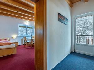 Posteľ alebo postele v izbe v ubytovaní Apartment Grissemann by Interhome