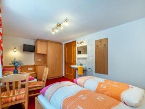 Posteľ alebo postele v izbe v ubytovaní Apartment Grissemann by Interhome