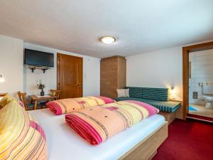 Posteľ alebo postele v izbe v ubytovaní Apartment Grissemann by Interhome