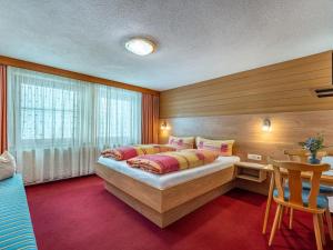 Posteľ alebo postele v izbe v ubytovaní Apartment Grissemann by Interhome