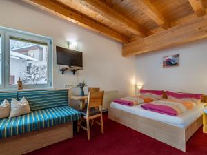 Posteľ alebo postele v izbe v ubytovaní Apartment Grissemann by Interhome
