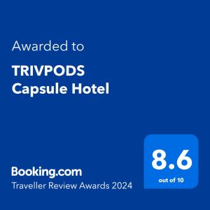 zrzut ekranu hotelu z tekstem przyznanym hotelu kapsułowemu Travods w obiekcie TRIVPODS Capsule Hotel w mieście Thiruvananthapuram