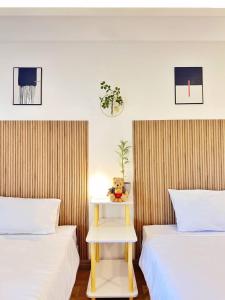 Postel nebo postele na pokoji v ubytování Palm Scenery Resort