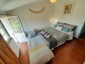 a bedroom with a bed and a sliding glass door at Coja Flores Beautiful River Beaches & Mountains in Coja