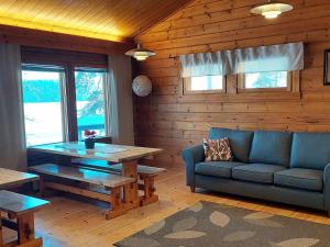 Posezení v ubytování Holiday Home Petäjälahti by Interhome