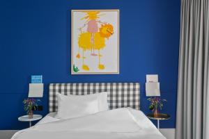 Ένα ή περισσότερα κρεβάτια σε δωμάτιο στο Boutique & Art Hotel Helvetia