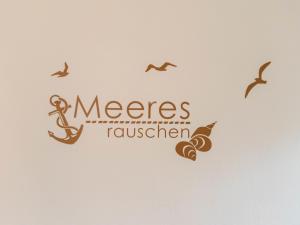 ノルトダイヒにあるApartment Meeresrauschen by Interhomeの鳥の飛来を見せる