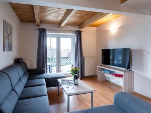 TV a/nebo společenská místnost v ubytování Holiday Home Holiday Hill 55 by Interhome + 36 fotografií