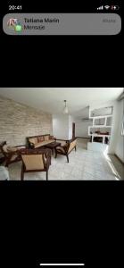 a picture of a living room with couches and tables at Departamento amplio para familias in Guayaquil