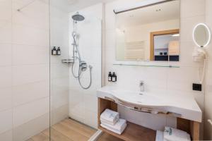 Ein Badezimmer in der Unterkunft Hotel Grüner Baum