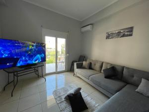 TV a/nebo společenská místnost v ubytování Jomaa luxury residence
