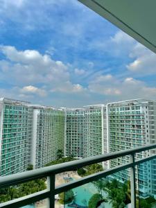 a view from the balcony of a large apartment building at The Bahamas & Maldives Suites at Azure Residences near Manila Airport in Manila