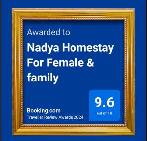 a framed sign for a homeaway for female and family at Nadya Homestay For Female & family in Jaipur