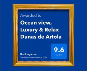 a gold picture frame with the text awarded to ocean view luxury and relax dums at Ocean view, Luxury & Relax Dunas de Artola in Marbella