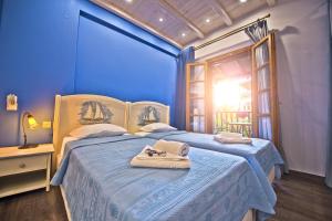 Postel nebo postele na pokoji v ubytování Flamingo Hotel Pelion - Seaside Superior Studios & Suites
