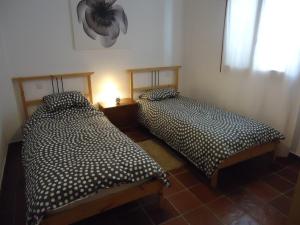 Postel nebo postele na pokoji v ubytování Playa Blanca Apartment, Marina Rubicon