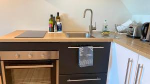 Kuchyň nebo kuchyňský kout v ubytování Villa la Korrigane vue mer cuisine privée