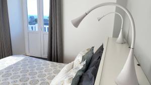 Postel nebo postele na pokoji v ubytování Villa la Korrigane vue mer cuisine privée