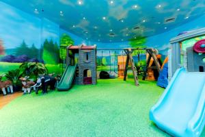 Zona de juegos para niños en Tykes Inn - Childcare and Day Hotel Exclusively for Kids