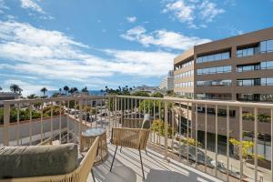 a balcony with a view of a building at Downtown Santa Monica Top Floor Ocean View 2BR/2BA in Los Angeles