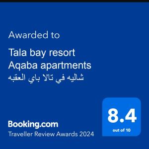 a screenshot of a cell phone with the text awarded to tala bay resort ap at one bedroom apartments aqaba on 2 swimming pool Tala bay in Aqaba