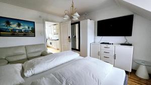 Postel nebo postele na pokoji v ubytování Höckner Plaza Hotel