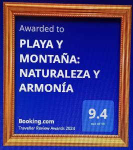 a picture of a sign in a frame at PLAYA Y MONTAÑA: NATURALEZA Y ARMONÍA in La Laguna