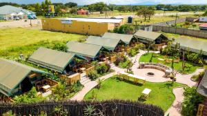 una vista aerea di un resort con parco giochi di Seven Ranges Hotel a Moroto