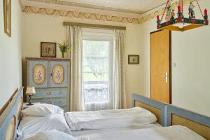 Postel nebo postele na pokoji v ubytování Hotel Harrida