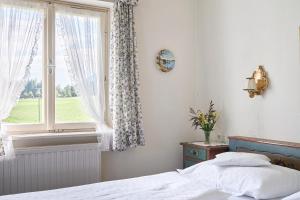 Postel nebo postele na pokoji v ubytování Hotel Harrida