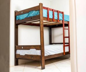 a couple of bunk beds in a room at Tides Lobitos in Lobitos