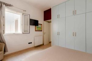 Postel nebo postele na pokoji v ubytování Camelia Apartment