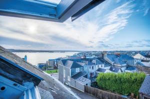 a view from the balcony of a house at Fulke Street - 2 Bedroom Apartment - Milford Haven in Milford Haven