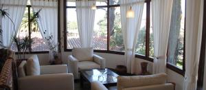 Photo de la galerie de l'établissement Hosteria Olimpo, à Villa Gesell 17 autres photos