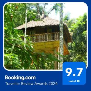 a tree house in the middle of the forest at Kalidasa Tree House and Villa, Wayanad in Chekadi