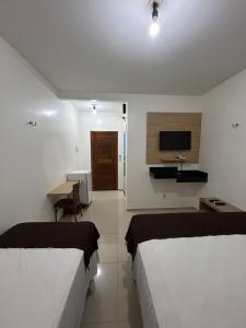Postel nebo postele na pokoji v ubytování Mais Hotel Express