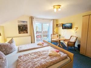 Postel nebo postele na pokoji v ubytování L9 - Urlaubsmagie - Balkon & direkt am Wanderweg