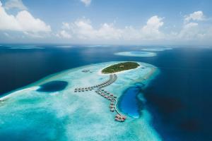 an aerial view of an island in the ocean at Vakkaru Maldives in Baa Atoll