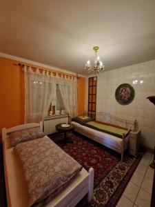 Postel nebo postele na pokoji v ubytování Stara Ruža