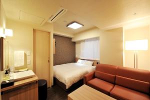 Posteľ alebo postele v izbe v ubytovaní Sanco Inn Grande Tokyo Hamamatsucho