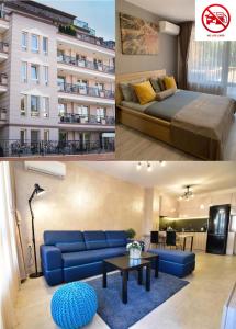 a living room with a blue couch and a building at Kapana Luxury City Center Apartments with Garage in Plovdiv