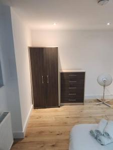 Postel nebo postele na pokoji v ubytování City Sparrow Apartment 2B