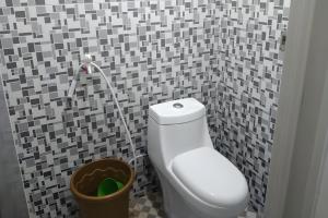 Koupelna v ubytování Penginapan Erbysa