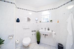 Koupelna v ubytování LaDolceVita - 100m2 Apartment in Zentraler Lage + 11 fotografií