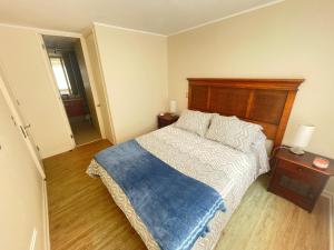 Ένα ή περισσότερα κρεβάτια σε δωμάτιο στο Departamento Puerto Varas, a pocos pasos del lago