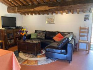 Ruang duduk di Gîte 'Olives en Provence'