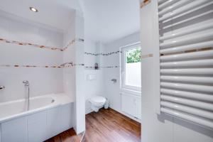 Ein Badezimmer in der Unterkunft Meer & Wald Wellness Appartements